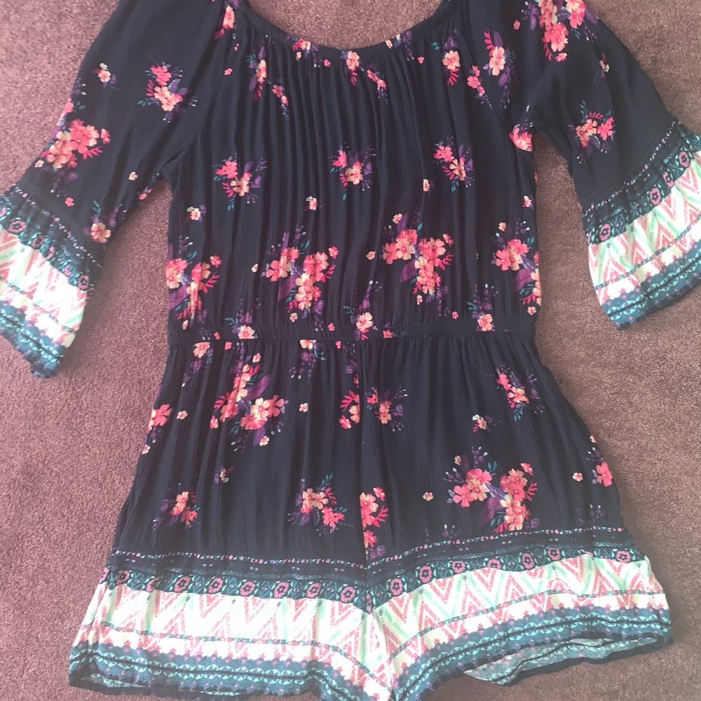 navy and floral romper size large